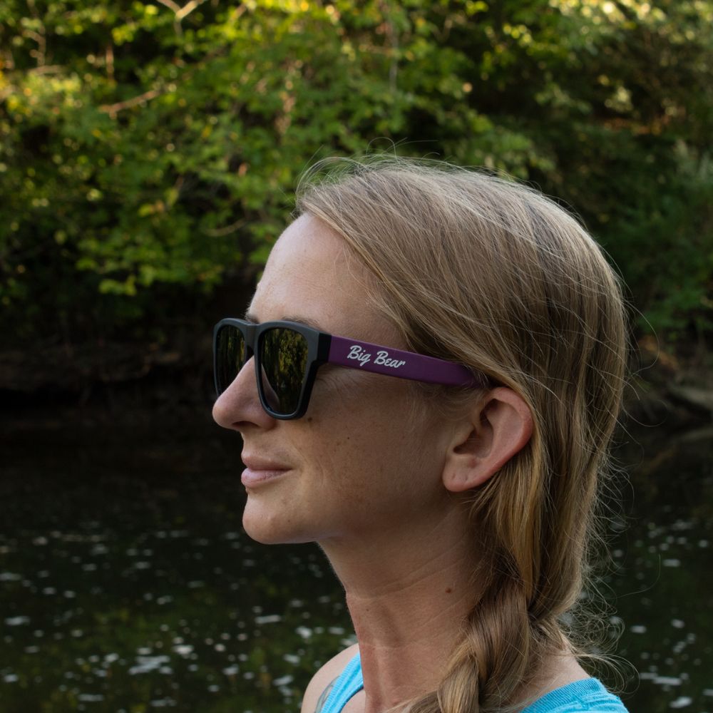 Square acetate sunglasses with fuchsia temples and green tint lens